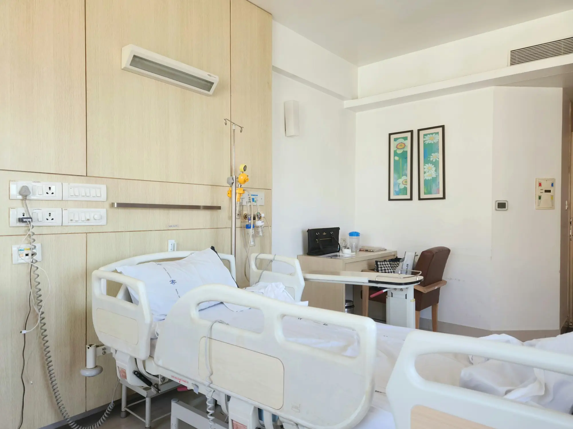 Newly fitted clinic room with beds and modern equipment